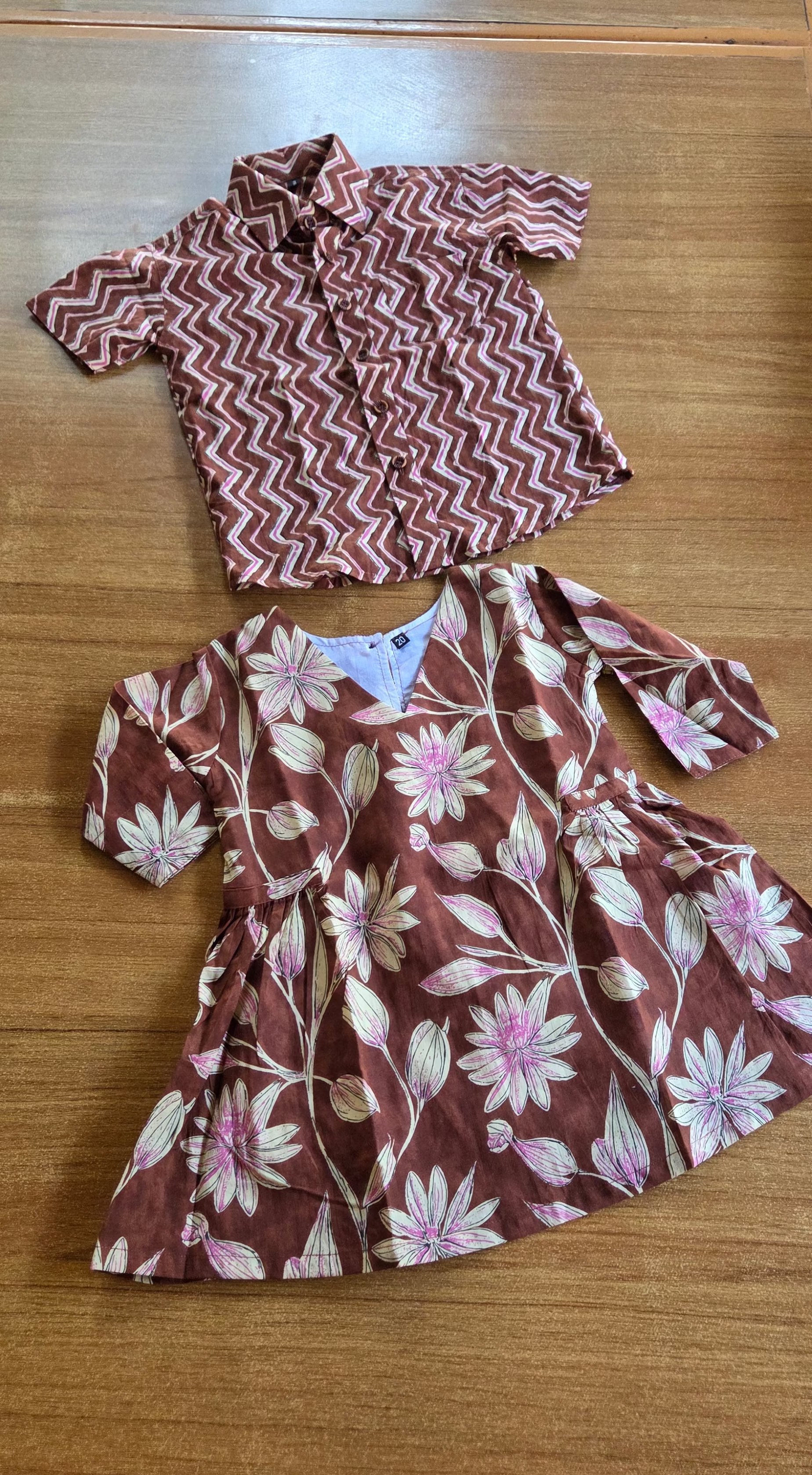 Brother Sister Twinning Shirt And Frock on a wooden surface